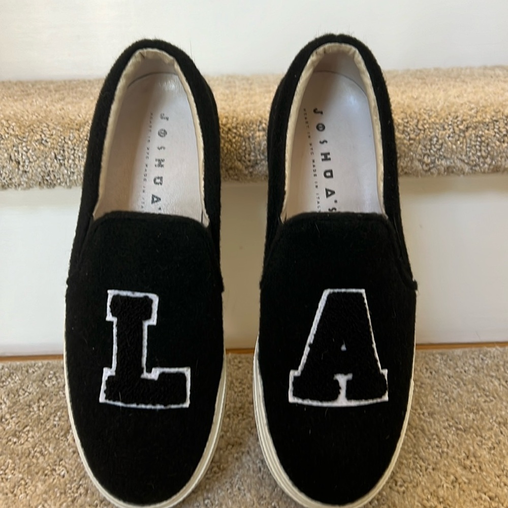 Joshua’s Slip in sneakers made in Italy. Soft material with “LA” on the front.